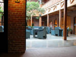 The central section of the building used to be a restaurant. You can see the brick and exposed beam motif used throughout.