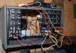My Synthtech MOTM modular is beginning to take shape. Left to right: 300 oscillator, power supply visible in background, 490 Moog lowpass filter, 800 envelope, 800 envelope, 190 voltage controlled amplifier. Kenton Pro 2 MIDI/CV converter is on top of the rack. 